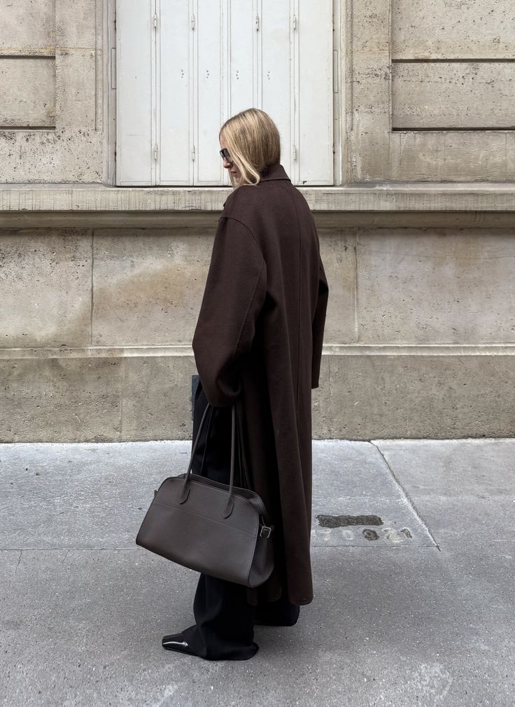 Masculine coats, fluid trousers, and logo-free leather goods. The only winter uniform you need.